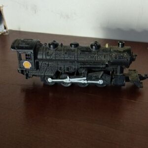 Black Model Train with Shell Logo